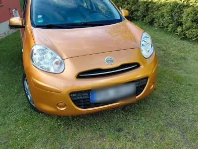 Gebraucht Nissan Micra Tekna 80 PS (58 kW) 2011 Orange Kleinwagen
