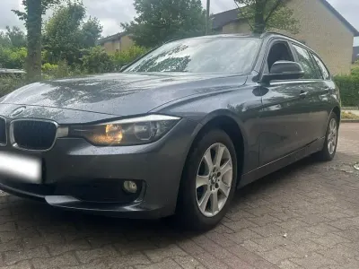 Gebraucht BMW 320 143 PS (105 kW) 2013 Grau Kombi