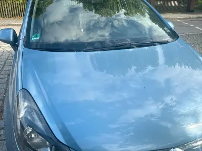 Gebraucht Opel Corsa 78 PS (57 kW) 2013 Blau Kleinwagen
