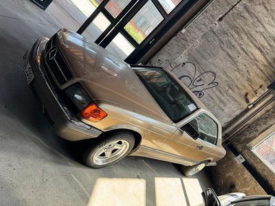 Second-hand Mercedes 560 1986 Auriu Coupe