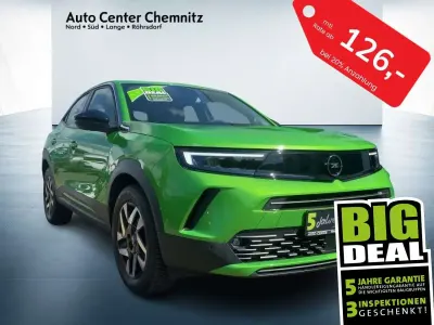 Gebraucht Opel Mokka Elegance 101 PS (74 kW) 2024 Matcha green SUV