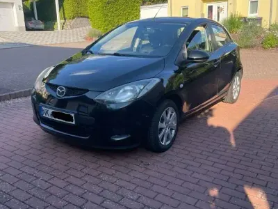 Gebraucht Mazda 2 75 PS (55 kW) 2010 Schwarz Kleinwagen