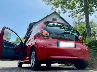 Gebraucht Toyota Aygo 69 PS (50 kW) 2009 Rot Kleinwagen