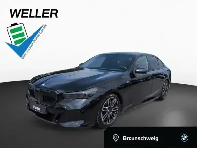 Gebraucht BMW 550e Comfort Edition 489 PS (359 kW) 2024 Black sapphire (schwarz) Limousine