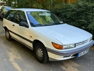 Gebraucht Mitsubishi Colt 84 PS (61 kW) 1990 Weiß Kleinwagen