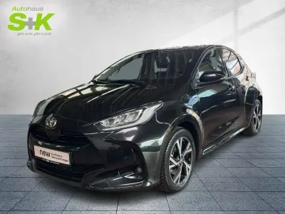 Gebraucht Toyota Yaris Hybrid 116 PS (85 kW) 2025 Black mica / ink (schwarz) Kleinwagen