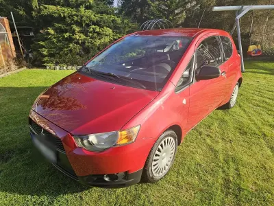 Gebraucht Mitsubishi Colt 75 PS (55 kW) 2009 Rot Kleinwagen