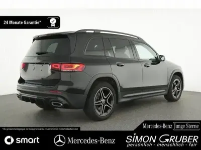 Gebraucht Mercedes GLB200 AMG 163 PS (119 kW) 2021 Lack kosmosschwarz (metallic) SUV