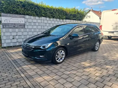 Gebraucht Opel Astra Innovation 125 PS (91 kW) 2017 Grün Kombi