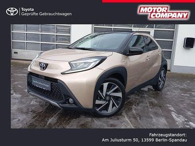Gebraucht Toyota Aygo X X-plore 72 PS (52 kW) 2023 Ginger beige metallic/ night sky black SUV