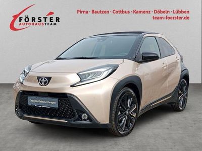 Gebraucht Toyota Aygo X Style 72 PS (52 kW) 2022 Ginger beige metallic/ night sky black SUV