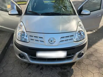 Gebraucht Nissan Pixo 68 PS (50 kW) 2010 Silber Kleinwagen
