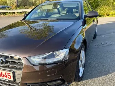 Używany Audi A4 Attraction 177 KM (130 kW) 2013 Brązowy Sedan/Limuzyna