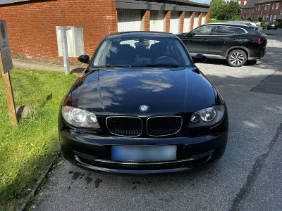Gebraucht BMW 116 122 PS (89 kW) 2009 Schwarz Kleinwagen