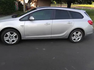 Gebraucht Opel Astra 130 PS (95 kW) 2014 Silber Kombi