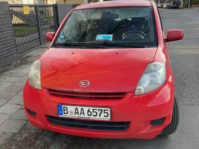 Gebraucht Daihatsu Sirion 69 PS (50 kW) 2009 Rot Kleinwagen