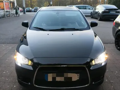 Gebraucht Mitsubishi Lancer 109 PS (80 kW) 2011 Schwarz Limousine