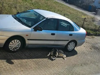 Gebraucht Mitsubishi Carisma 90 PS (66 kW) 1998 Silber Limousine