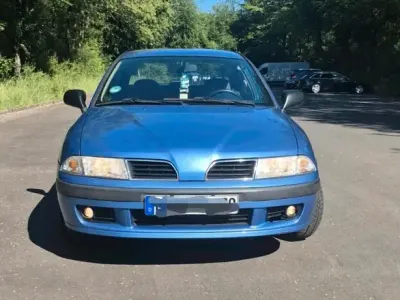 Begagnad Mitsubishi Carisma 99 HK (72 kW) 1999 Blå Sedan