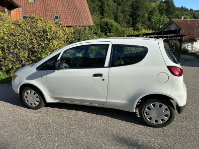 Gebraucht Mitsubishi Colt 75 PS (55 kW) 2009 Weiß Kleinwagen