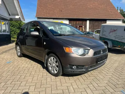 Gebraucht Mitsubishi Colt Top 95 PS (69 kW) 2011 Braun Kleinwagen