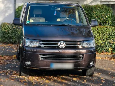 Używany VW T5 Highline 179 KM (131 kW) 2013 Brązowy Van