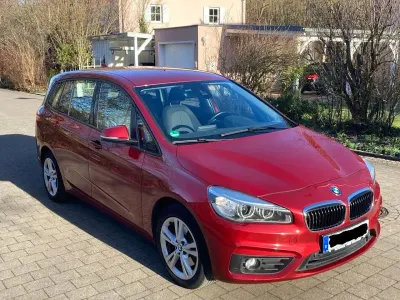 Używany BMW 218 Advantage 136 KM (100 kW) 2016 Czerwony Kombi
