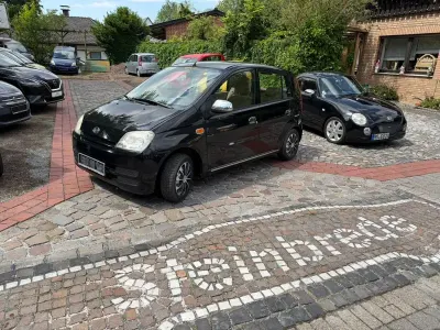 Gebraucht Daihatsu Cuore Plus 58 PS (42 kW) 2005 Schwarz Kleinwagen