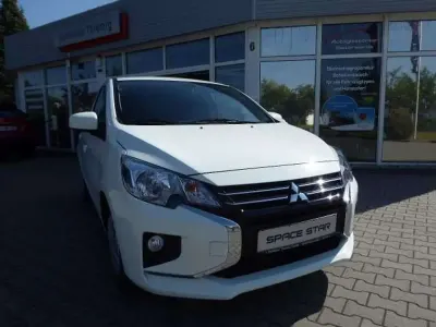 Gebraucht Mitsubishi Space Star Select 71 PS (52 kW) 2024 Islandweiß Limousine