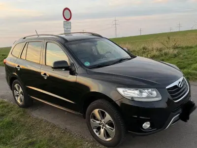 Second-hand Hyundai Santa Fe Premium 197 CP (144 kW) 2011 Negru SUV