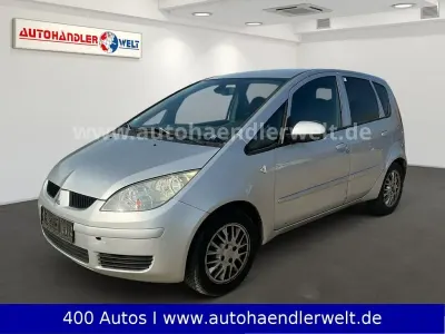 Second-hand Mitsubishi Colt Invite 95 CP (69 kW) 2006 Argintiu Berlinǎ