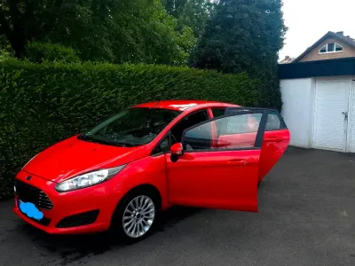 Używany Ford Fiesta 101 KM (74 kW) 2014 Czerwony Hatchback