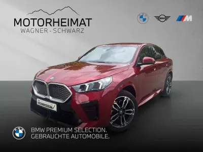 Gebraucht BMW iX2 M Sport 230 kW (313 PS) 2025 Fire red metallic SUV