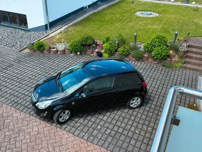 Gebraucht Opel Corsa Satellite 69 PS (50 kW) 2011 Schwarz Kleinwagen