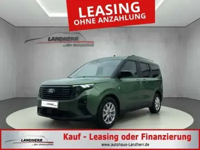Gebraucht Ford Tourneo Courier Titanium 125 PS (91 kW) 2025 Bursting green Van / Kleinbus