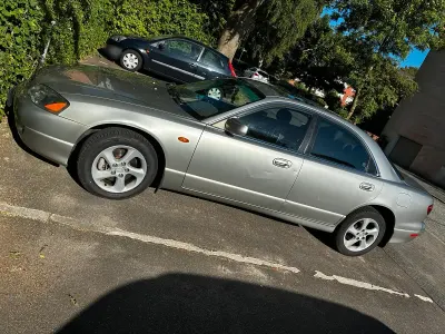 Używany Mazda Xedos 163 KM (119 kW) 2001 Złoty Sedan/Limuzyna