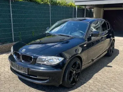 Gebraucht BMW 116 122 PS (89 kW) 2010 Schwarz Kleinwagen