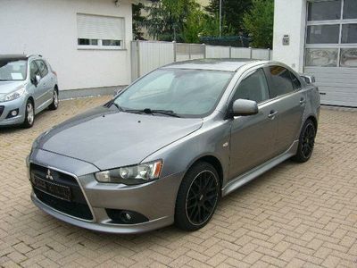 Gebraucht Mitsubishi Lancer 116 PS (85 kW) 2014 Grau metallic Limousine