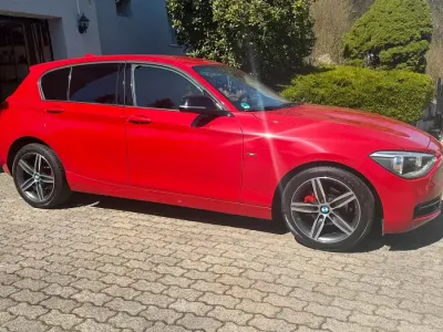 Gebraucht BMW 116 Sport Line 136 PS (100 kW) 2012 Rot Kleinwagen