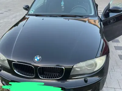 Gebraucht BMW 116 122 PS (89 kW) 2008 Schwarz Kleinwagen