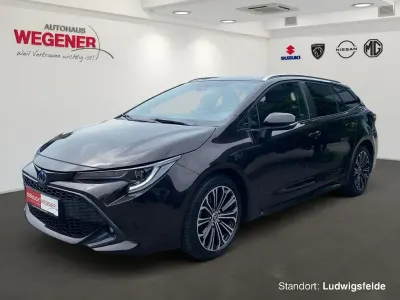 Gebraucht Toyota Corolla Hybrid Team 152 PS (111 kW) 2022 Phantom brown metallic Kombi