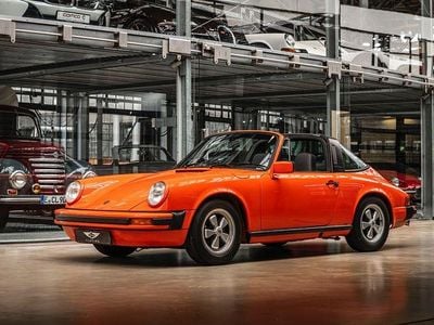 Second-hand Porsche 911 165 CP (121 kW) 1977 Portocaliu Coupe