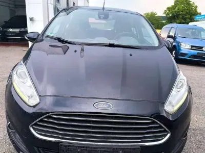 Gebraucht Ford Fiesta Titanium 101 PS (74 kW) 2012 Pantherschwarz metallic Kleinwagen