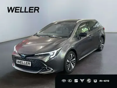 Neu Toyota Corolla Hybrid 196 PS (144 kW) 2026 Grey metallic (1g3)/black mica Kombi