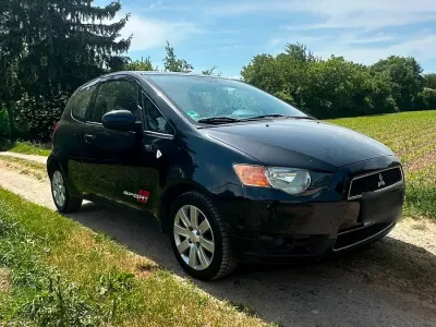 Occasion Mitsubishi Colt 95 PK (69 kW) 2011 Zwart Hatchback