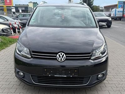 Second-hand VW Touran 105 CP (77 kW) 2015 Argintiu Monovolum