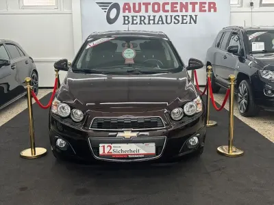 Gebraucht Chevrolet Aveo LT 101 PS (74 kW) 2013 Braun Kleinwagen