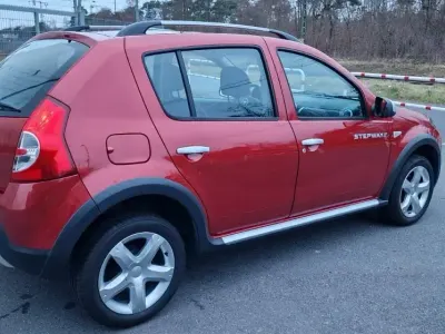 Gebraucht Dacia Sandero Stepway 84 PS (61 kW) 2012 Rot Limousine