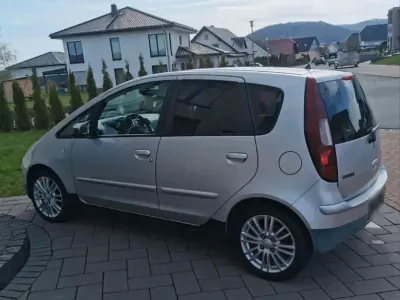 Gebraucht Mitsubishi Space Star 95 PS (69 kW) 2008 Silber Kleinwagen