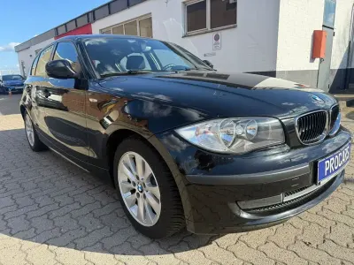 Gebraucht BMW 116 Advantage 122 PS (89 kW) 2010 Schwarz Kleinwagen